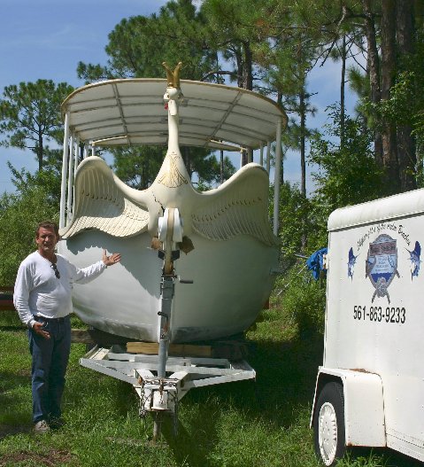 Swan and boat reunited